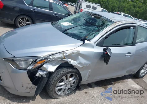 2017 Toyota Yaris Ia из США, поврежденный, VIN 3MYDLBYV3HY170232